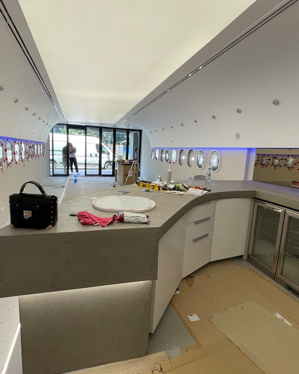 As found: the bar counter under construction with the fridges installed and the floor under protection.